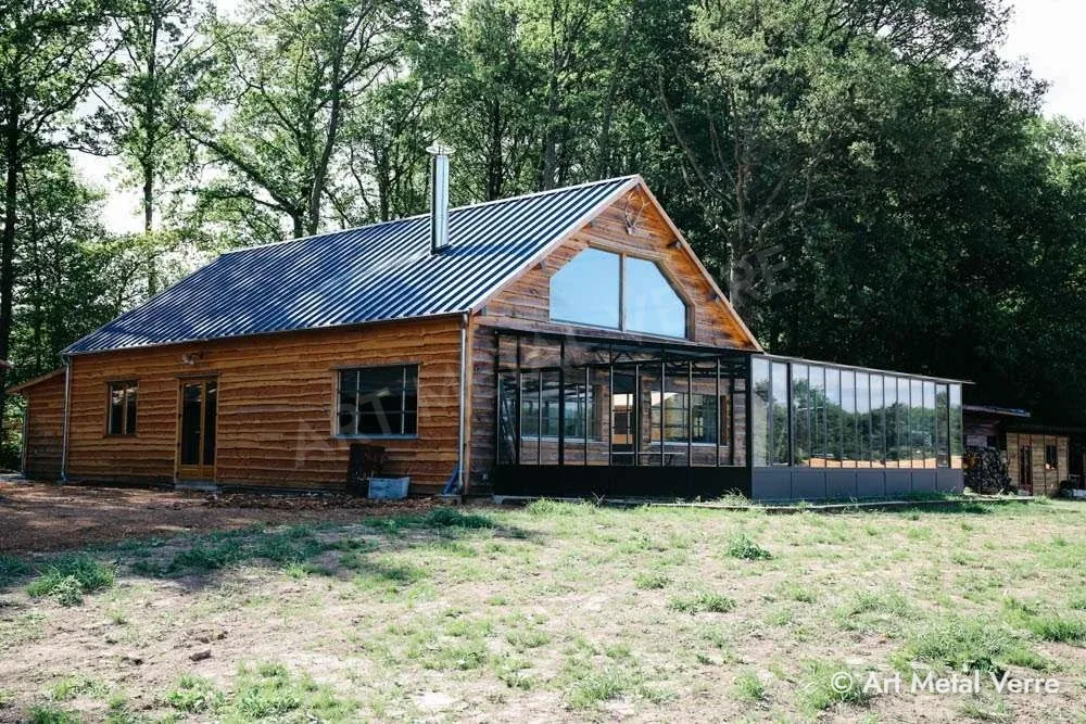 Véranda acier sur maison en bois – Art Metal Verre